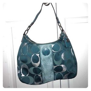 Teal and silver COACH purse